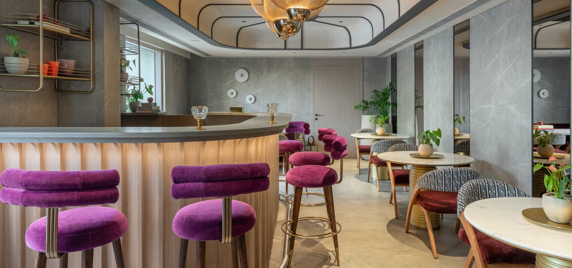 Cafe with cozy seating arrangements at Piramal Revanta